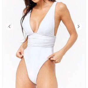 Deep plunge one piece bathing suit